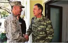  ?? AP ?? The US chairman of the Joint Chiefs of Staff, Gen. Joseph Dunford (left), and Turkey’s Chief of Staff Gen. Hulusi Akar at a meeting in Incirlik Airbase in Adana, Turkey.