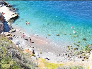  ?? ?? Avlaki Beach in Hydra is accessed down 85 steps from the clifftop footpath.*