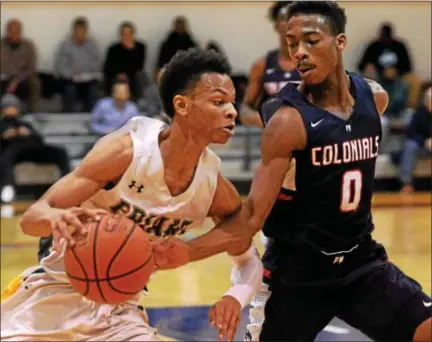  ?? BOB RAINES — DIGITAL FIRST MEDIA ?? Plymouth Whitemarsh’s Ish Horn tries to steal the ball as Bonner-Prendergas­t’s Isaiah Wong drives for the basket.