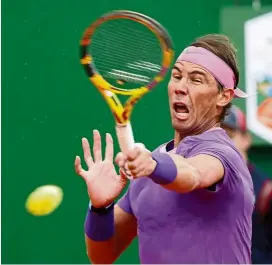  ?? — Reuters ?? Back to you: Rafael Nadal returning a shot to Grigor Dimitrov during the Monte Carlo Masters third-round match in France.