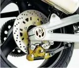  ??  ?? Aluminium swingarm and dampers give it a purposeful feelThe brakes look impressive yet repeated hard use isn’t their forte