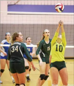  ?? PETE BANNAN - DIGITAL FIRST MEDIA ?? Bishop Shanahan’s Jenna Losito hits a reverse shot in the Eagles’ 3-0 victory over Downingtow­n West in their District 1-AAAA semifinal Thursday.