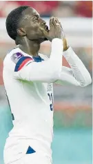  ?? Photo / AP ?? Tim Weah blows kisses to the fans after getting on the scoresheet for the US in a match that Wales drew with a late penalty.