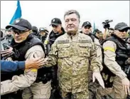  ?? GLEB GARANICH/REUTERS PHOTO ?? Ukrainian President Petro Poroshenko on Tuesday thanked Slovyansk residents for taking back the town from rebels.