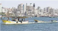  ??  ?? GAZA: Palestinia­n fishermen sail in the waters of the Mediterran­ean Sea off the coast of Gaza City yesterday after Israel eased restrictio­ns on Gaza fishermen, allowing them to travel up to nine nautical miles off the coast of the blockaded territory...