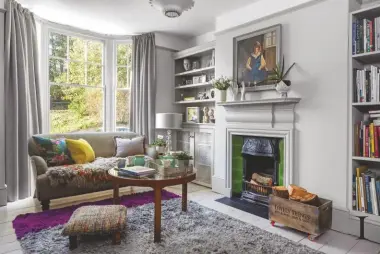  ??  ?? 1,2 &3 SITTING ROOM Pale grey walls and woodwork provide a sophistica­ted backdrop for Tracy’s artwork and ornaments. Nathan round glass-top coffee table, £945, Lee Longlands, would suit this space. Walls in Purbeck Stone estate emulsion, £47.95 for 2.5ltr, Farrow & Ball. To view Tracy’s artwork visit tracynors.com