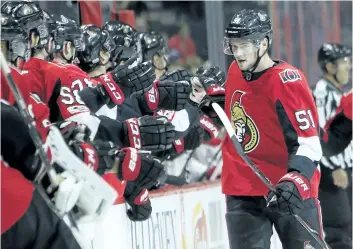  ?? FRED CHARTRAND/THE CANADIAN PRESS ?? Ottawa Senators’ Logan Brown celebrates his goal against the Montreal Canadiens with teammates during first period NHL pre-season hockey in Ottawa, on Saturday.
