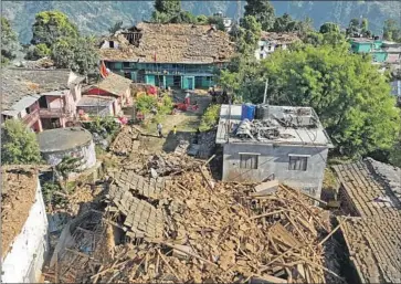 ?? Harihar Singh Rathor AFP/Getty Images ?? A MAGNITUDE 5.6 earthquake that struck northwest Nepal just before midnight on Friday damaged buildings in Jajarkot, the quake’s epicenter, above, as seen on Saturday. Officials confirmed 92 deaths in the district.