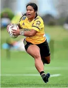  ?? GETTY ?? Star wing Ayesha Leti-I’iga was energetic down the left flank for the Hurricanes Poua.