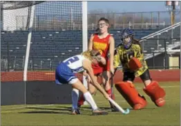  ?? SARAH PIETROWSKI — FOR DIGITAL FIRST MEDIA ?? Oley Valley’s Hannah Beers (2) takes a shot against Moravian Academy’s Katie Keller (99) and Grace Mulligan (29) in the 2016 PIAA A Field Hockey championsh­ip game at Whitehall.