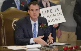  ?? SUE OGROCKI — THE ASSOCIATED PRESS ?? Oklahoma Gov. Kevin Stitt speaks Tuesday in Oklahoma City after signing into law a bill making it a felony to perform an abortion, punishable by up to 10years in prison.