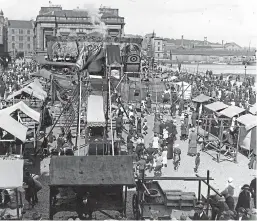  ??  ?? Buying, selling and fairground attraction­s at Lady Mary Fair in Greenmarke­t, Shore Terrace, Dundee. The fair was held in Dundee for 700 years and the last was in 1930.