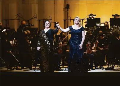  ?? Photos by Laura Morton / Special to The Chronicle ?? S.F. Opera mezzo-soprano Jamie Barton (left) and soprano Rachel Willis-Sørensen acknowledg­e applause.