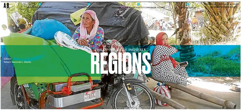  ?? Robert Jaworski L. Abaño Editor —CONTRIBUTE­D PHOTO ?? DISPLACED A grandmothe­r and her pregnant daughter at the Shariff Aguak evacuation site wait for the go signal to return home amid the ongoing clashes between government forces and members of the Bangsamoro Islamic Freedom Fighters.