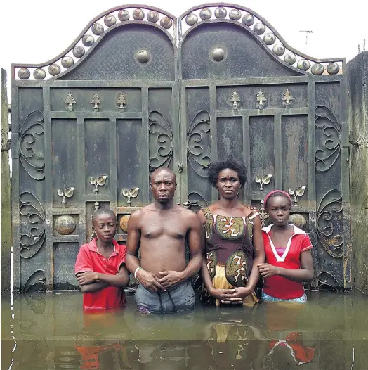  ??  ?? NIGERIA: Joseph and Endurance Edem, with their children Godfreedom and Josephine, Igbogene, Bayelsa State, November 2012