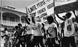  ?? Photograph: Supplied ?? The Against Testing on Mururoa (ATOM) committee protests on the streets of Suva, Fiji, in the 1970s