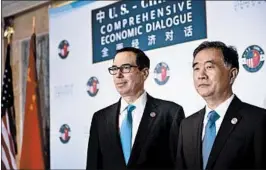  ?? BRENDAN SMIALOWSKI/GETTY-AFP 2017 ?? Treasury Secretary Steven Mnuchin hosts Chinese Vice Premier Wang Yang last year at the department. On Sunday, the sides agreed to back off from imposing tariffs on each other.