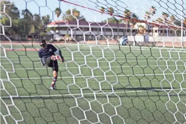  ?? PHOTOS BY OLIVIA GYAPONG/THE REPUBLIC ?? Blind soccer player Alvaro Mora Arellano practices at Arizona Christian University in Glendale. The 36-year-old is now a forward for the U.S. national team for blind soccer.