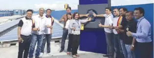  ??  ?? SM City Cauayan recently launched its 342-panel solar power facility capable of producing approximat­ely 105,678 kWh annually – enough to light up 9,700 10-watt light bulbs or fully charge 26,358 cellphones. In photo (from left): Councilor Gary...