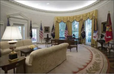  ??  ?? The newly refreshed Oval Office of the White House is seen in Washington, Tuesday, Aug. 22, 2017, during a media tour. New wallpaper was hung and the floors were refinished this month as part of a series of updates to the West Wing.