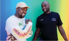  ?? Swan Gallet/WWD/Rex/Shuttersto­ck ?? Kanye West and Virgil Abloh in the front row Louis Vuitton show, June 2018. Photograph: