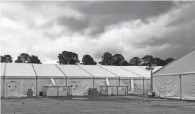  ?? LOLITA BALDOR/AP FILE ?? Quarantine tents are set up for recruits arriving at the Marine Corps’ Parris Island Recruit Depot in May.