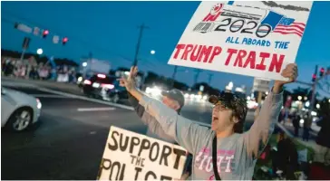  ?? GETTY IMAGES ?? Supporters of President Donald Trump rally Saturday outside Walter Reed National Military Medical Center.