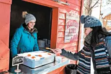  ??  ?? Maple syrup poured over fresh snow makes a sweet treat.