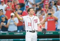  ?? NICK WASS/AP ?? Ryan Zimmerman thanks the crowd after he came out of his final game with the Washington Nationals on Oct. 3, 2021. The former Kellam High and UVA star is among the 2023 Hampton Roads Hall of Fame induction class.