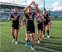  ?? PHOTOSPORT ?? The Warriors celebrate their surprise win over the Canberra Raiders on Saturday, but theirs was a season with more lows than highs.