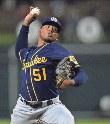  ?? JOE CAMPOREALE / USA TODAY SPORTS ?? Brewers pitcher Freddy Peralta’s contract has team options for 2025 and 2026 that could make the deal worth $30 million.