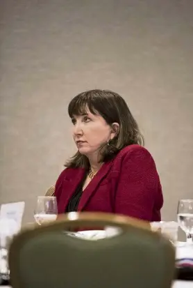  ??  ?? Jo Jorgensen, the Libertaria­n candidate for president in 2020, listens to Scott Horton, author and editorial director for Antiwar.com, speak during the annual state convention. She got 1.1% of the popular vote in the 2020 election.