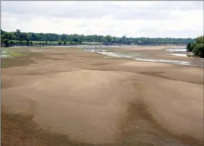  ?? Special to the Democrat-Gazette/MATT MEYER ?? The Arkansas River is shown south of the 21st Street Bridge in Tulsa. During the daytime, the riverbed is dry and can be crossed on foot.