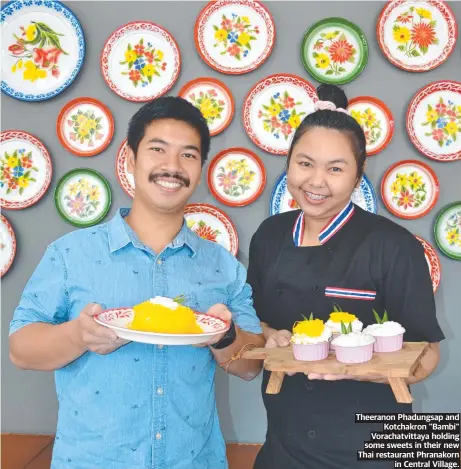  ?? ?? Theeranon Phadungsap and Kotchakron "Bambi" Vorachatvi­ttaya holding some sweets in their new Thai restaurant Phranakorn in Central Village.