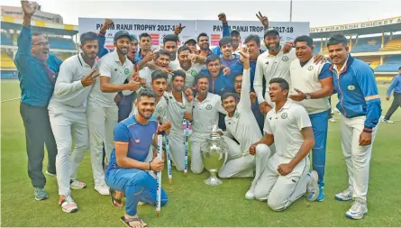  ?? — PTI ?? Vidarbha players celebrate after winning their maiden Ranji Trophy title on Monday.