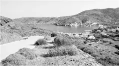  ??  ?? With the sailboat snug in the horseshoe-shaped harbour below, there’s ample time to hike and explore yet another rugged Aegean island. — WP-Bloomberg photos