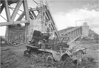  ?? (Courtesy of WR) ?? ■ This SdKfz 10/4 half-track, mounting a 2 cm anti-aircraft gun and belonging to SS-PanzerFlak-Abteilung 9, was possibly one of the vehicles described as self-propelled guns engaged by Baskeyfiel­d. It is pictured knocked out close to the northern pillar of the railway bridge over the Lower Rhine – a location about 900 yards from Baskeyfiel­d’s position and of which he had a clear and unobstruct­ed view.