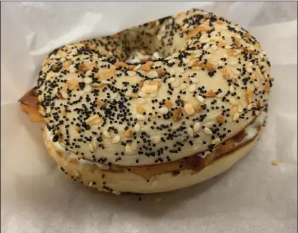  ?? (Arkansas Democrat-Gazette/Eric E. Harrison) ?? Lox, cream cheese and capers on an everything bagel is available now only to go at Morningsid­e Bagels on Maumelle Boulevard in North Little Rock.