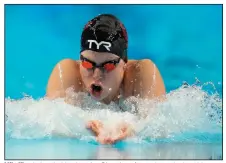  ?? (AP/Charlie Neibergall) ?? Lilly King is headed back to the Olympics after a victory in the 100-meter breaststro­ke Tuesday night at the U.S. swimming trials in Omaha, Neb.