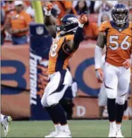  ?? JACK DEMPSEY — THE ASSOCIATED PRESS ?? Denver Broncos outside linebacker Von Miller (58) celebrates a defensive stop against the Los Angeles Rams during the first half of an NFL preseason football game, Saturday in Denver.