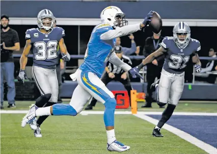  ?? MICHAEL AINSWORTH/THE ASSOCIATED PRESS ?? Chargers wide receiver Keenan Allen sprints toward the endzone past Cowboys defenders Orlando Scandrick, left, and Byron Jones on Thursday in Dallas. The Chargers won, 28-6.