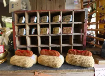  ?? Helen H. Richardson, The Denver Post ?? Crocheted hot dogs are for sale inside The Fun & Funky Art Gallery and Gift Shop which will be part of the sale of the Coney Island Boardwalk restaurant.