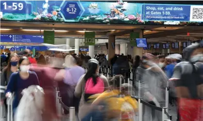  ?? Photograph: Paul Hennessy/Sopa Images/Rex/Shuttersto­ck ?? Passengers at Orlando airport, US. More than 3,600 incidents this year involved people who refused to wear face masks.