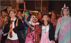  ?? MARIAN DENNIS — DIGITAL FIRST MEDIA ?? Kids dressed in their Halloween best Tuesday as they walked in the parade down High Street in Pottstown.