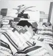  ?? TWITTER ?? John Tavares as a kid, sleeping under Maple Leafs covers.