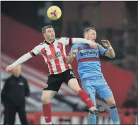  ?? PICTURE: MIKE EGERTON/ PA ?? BACK IN ACTION: Sheffield United’s John Fleck and West Ham’s Vladimir Coufal battle for the ball at Bramall Lane.