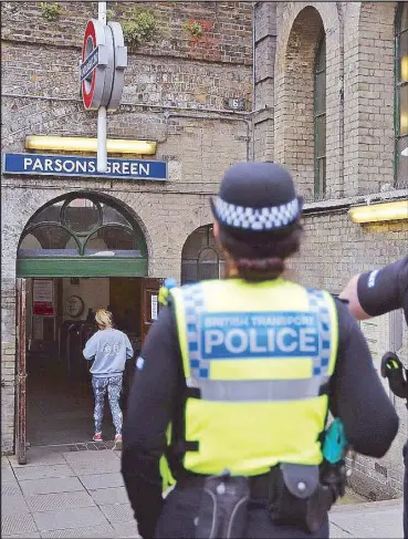  ?? AP ?? Police forces guard the entrance to Parsons Green Station following Friday’s terror incident on the tube in London yesterday.