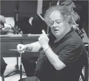  ?? MIGUEL MEDINA / AFP / GETTY IMAGES FILES ?? James Levine in 2007. New York’s Metropolit­an Opera has suspended the legendary conductor after three men alleged he had molested them when they were underage.