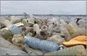  ?? ISSOUF SANOGO — GETTY IMAGES ?? Plastic bottles and other waste cover a beach after being washed ashore near the port of Abidjan, Ivory Coast, in 2015.