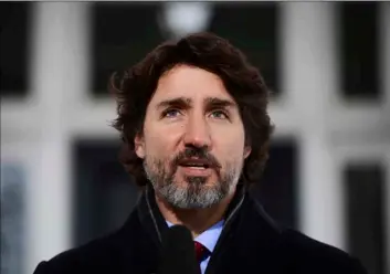  ?? Sean Kilpatrick/The Canadian Press via AP ?? Prime Minister Justin Trudeau holds a news conference at Rideau Cottage in Ottawa on Friday.